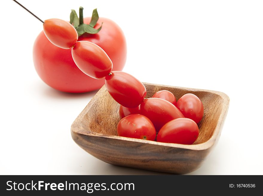 Cherry tomatoes in the wood bowl