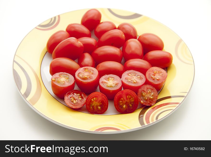 Cherry tomatoes on ceramics plate. Cherry tomatoes on ceramics plate