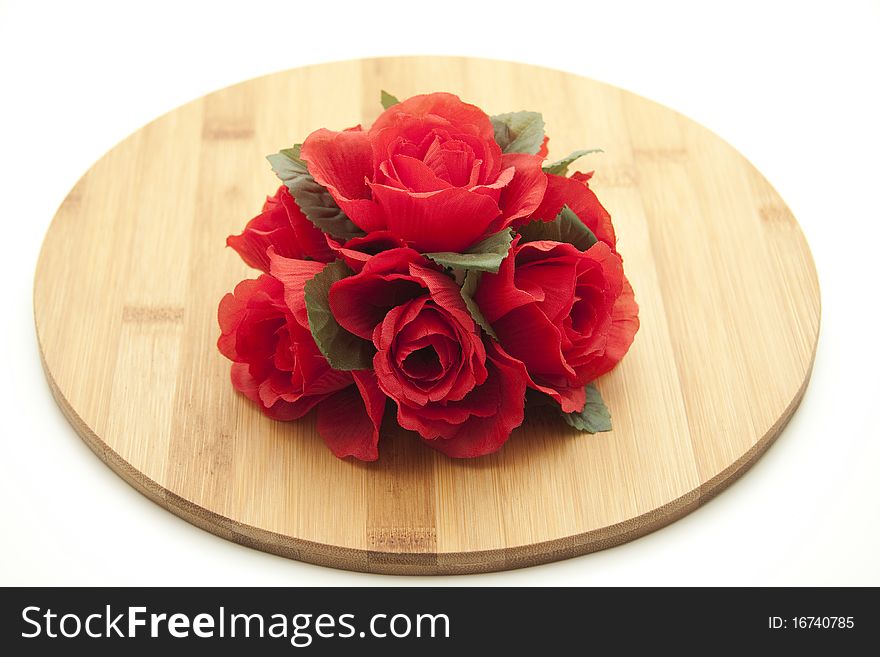 Bunch of roses on wood board