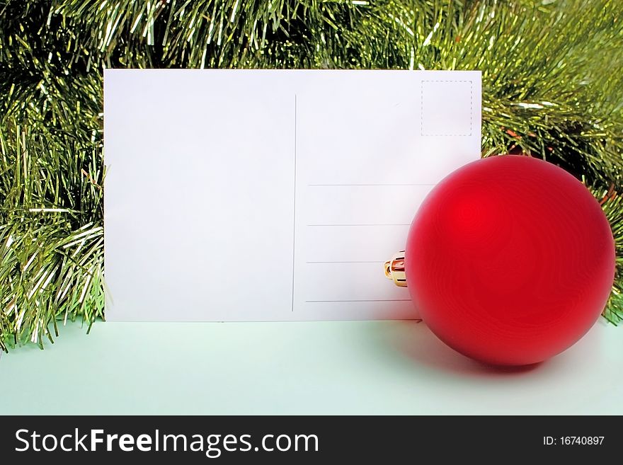 New year's postcard with green fir and red ball. New year's postcard with green fir and red ball