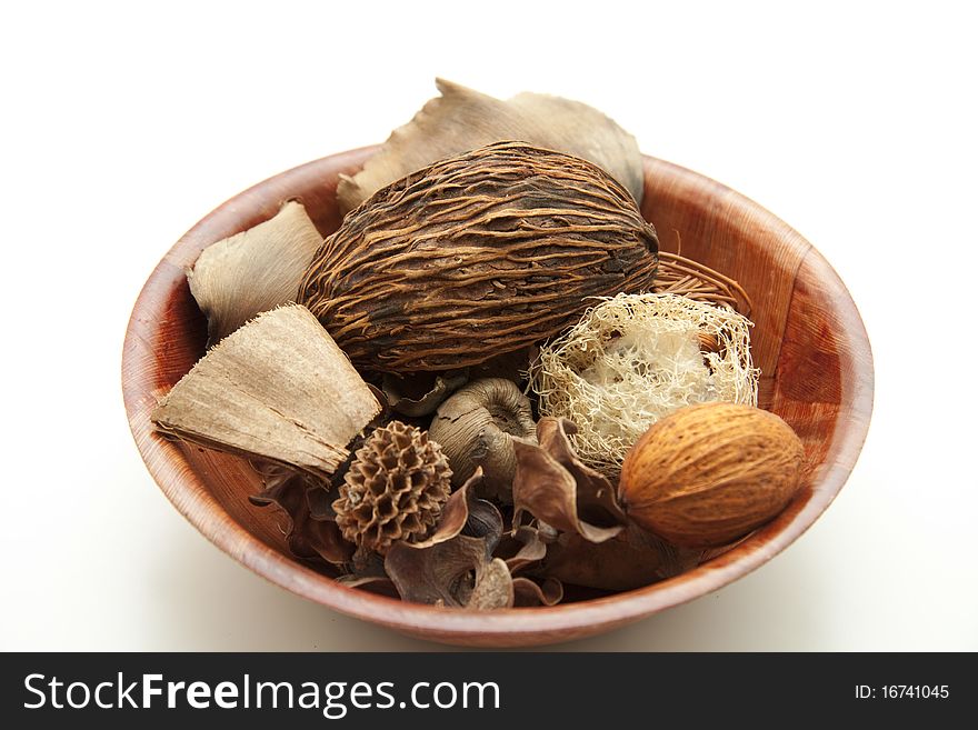 Nutshells with fragrance in the wood bowl