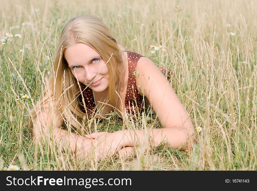 Summer portrait of the beautiful fair-haired girl