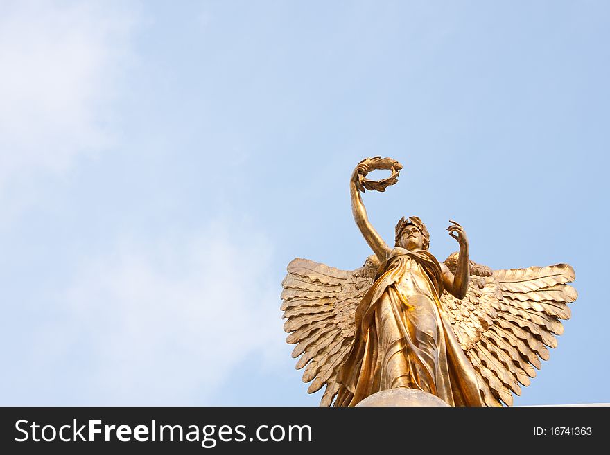 Goddess statue in the sky on a clear sky, beautiful clouds. Goddess statue in the sky on a clear sky, beautiful clouds.