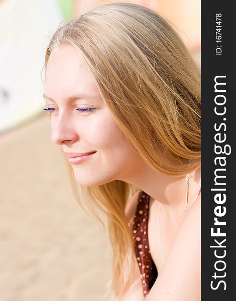 Summer portrait of the beautiful fair-haired girl