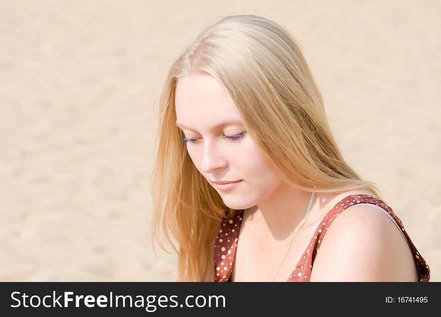 Summer portrait of the beautiful fair-haired girl