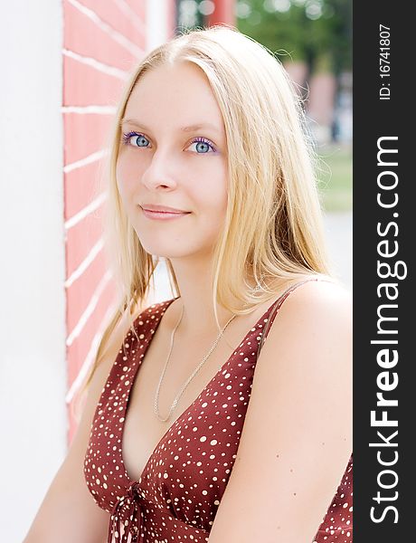 Summer portrait of the beautiful fair-haired girl