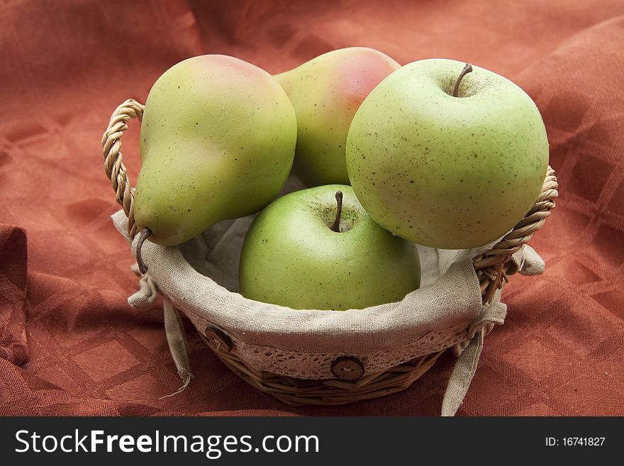 Apples and pears in the basket. Apples and pears in the basket