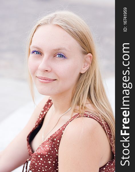 Summer portrait of the beautiful fair-haired girl