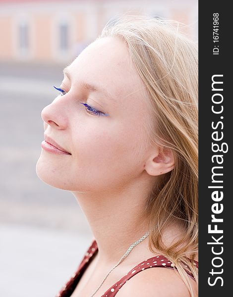 Summer portrait of the beautiful fair-haired girl