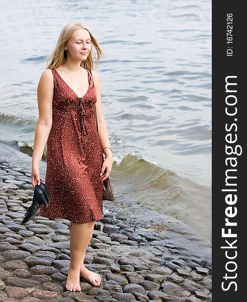 Summer portrait of the beautiful fair-haired girl