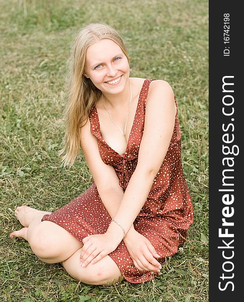 Summer portrait of the beautiful fair-haired girl