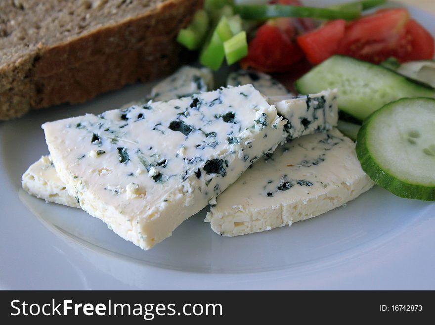 Blue cheese with cucumber and tomatoes