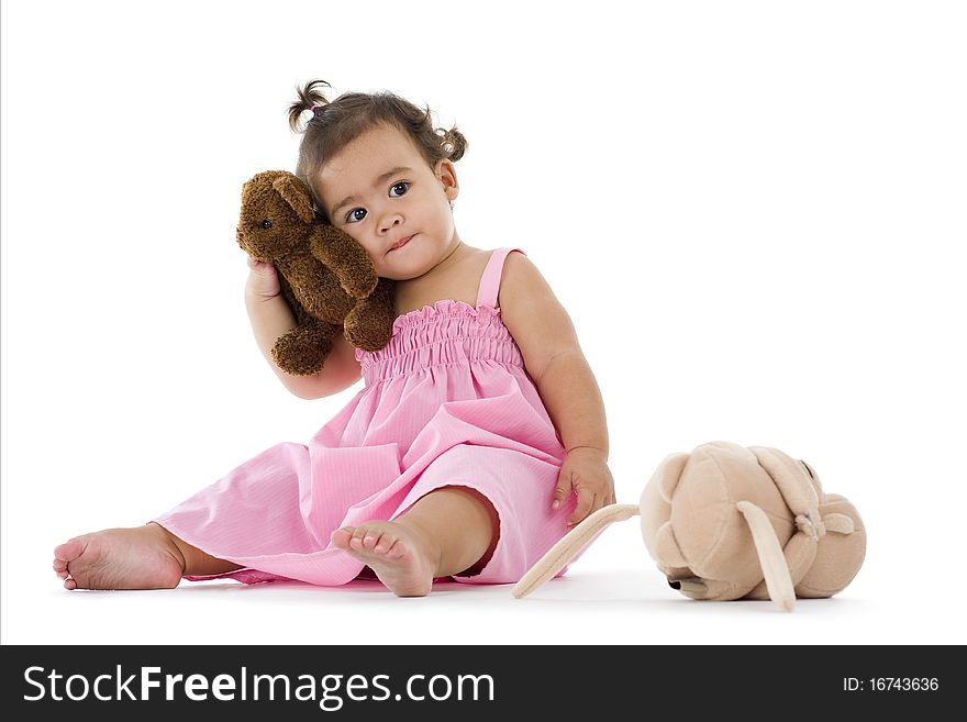 Cute little girl with teddy, isolated on white