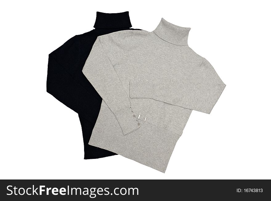 Two trendy sweaters isolated on a white background. Two trendy sweaters isolated on a white background.