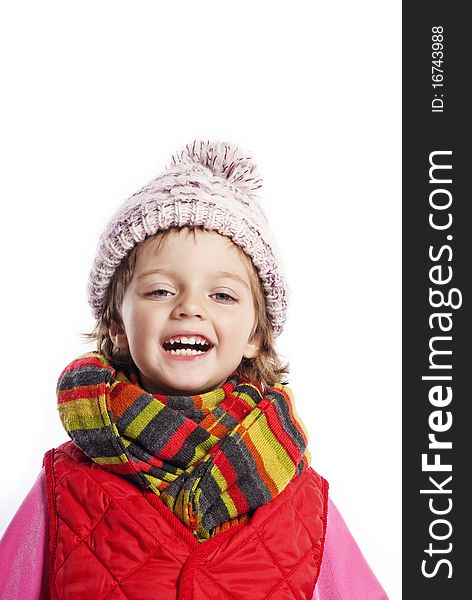 three years old little girl wearing winter clothes isolated