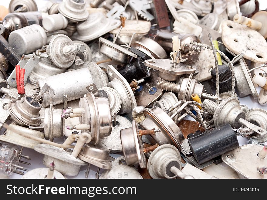 Old radio components on white