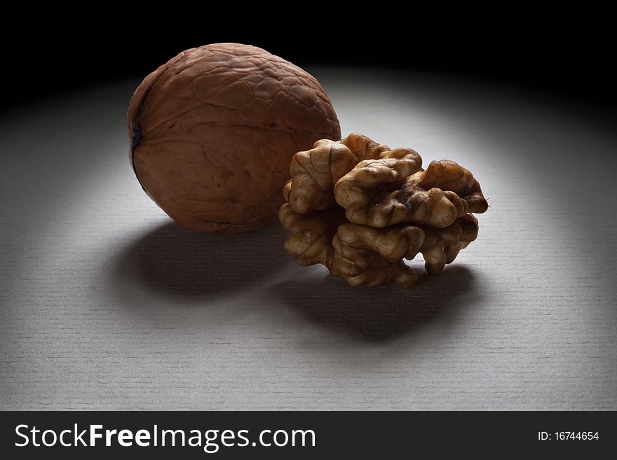 Walnut and a cracked peel walnut