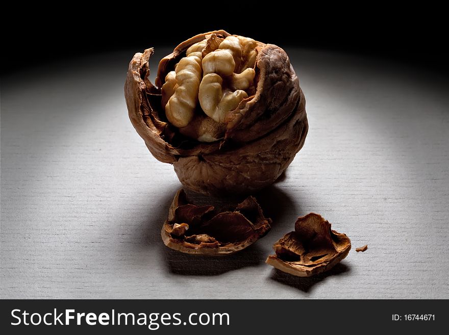 Walnut and a cracked peel walnut