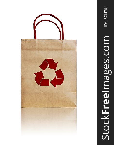 Brown shopping bag with recycle symbol isolated on white background