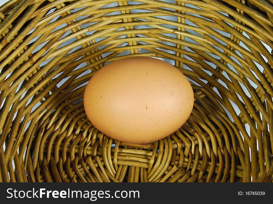 Fresh egg in vintage style basket. Fresh egg in vintage style basket