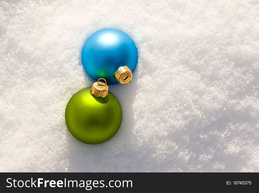Holiday series: Christmas green ball decoration and snow. Holiday series: Christmas green ball decoration and snow