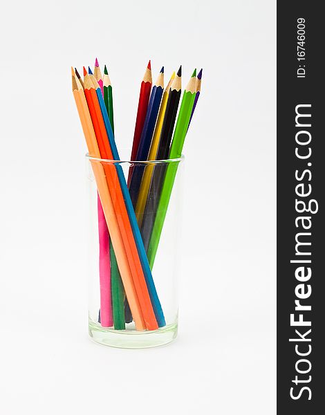 A clockwise standing pencils in a glass. A clockwise standing pencils in a glass