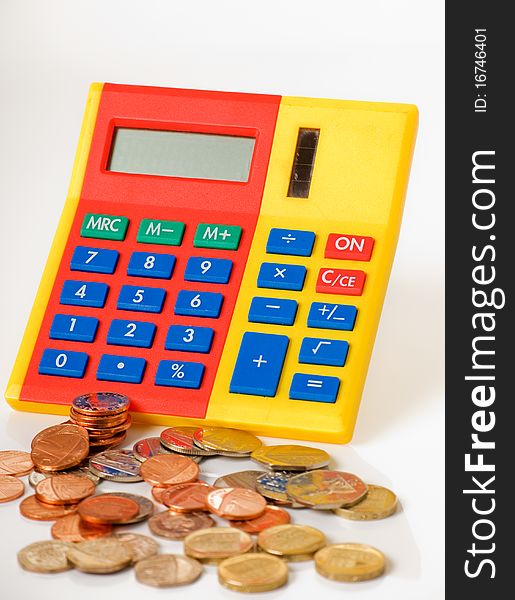 A vertical image of a calculator and money
