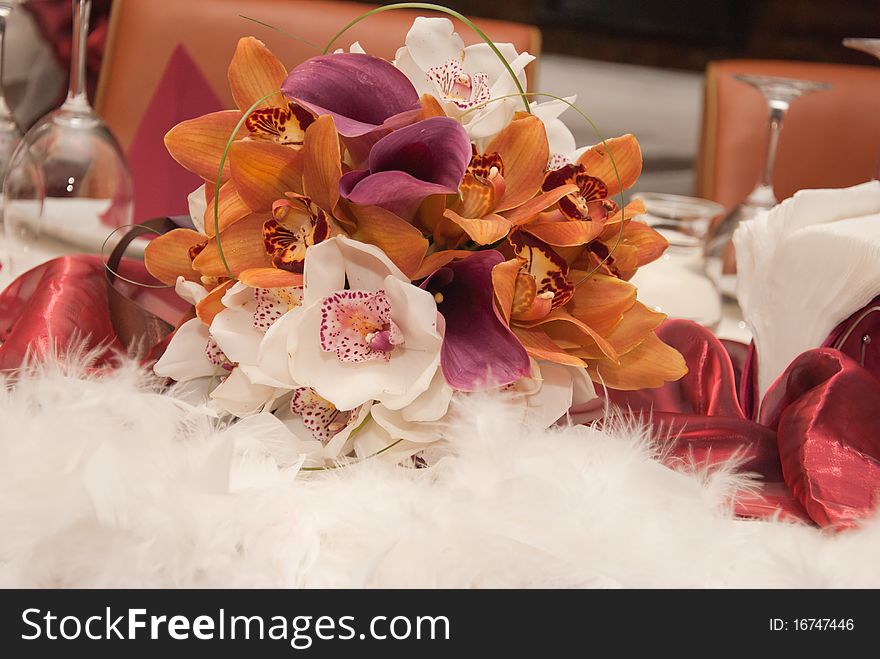 Bride's bouquet on a wedding table. Bride's bouquet on a wedding table.