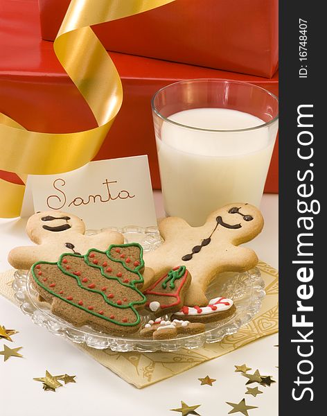 Traditional Christmas cookies and a glass of milk for Santa. Traditional Christmas cookies and a glass of milk for Santa