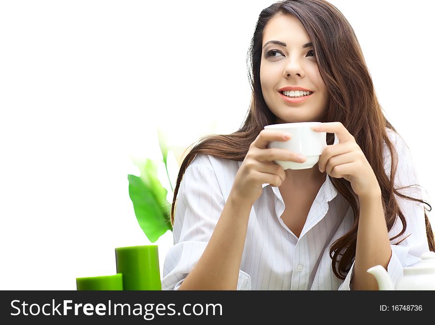 Beautiful woman in cafe over white background with flowers. Beautiful woman in cafe over white background with flowers