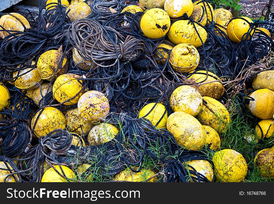 Floats with rope used to find commercial lobster traps at sea. Floats with rope used to find commercial lobster traps at sea