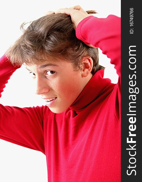 A teen boy in red looking. A teen boy in red looking