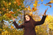 Girl And Falling Leaves Stock Photo Girl And Falling Leaves Stock Photo