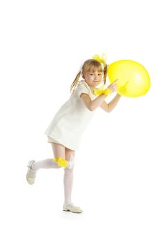 Girl With Yellow Balloon Royalty Free Stock Photos