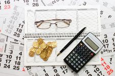 Sheets Of A Calendar With Coins And A Notebook Royalty Free Stock Image Sheets Of A Calendar With Coins And A Notebook Royalty Free Stock Image