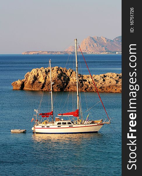 White ship in bay of Rhodes island, Greece