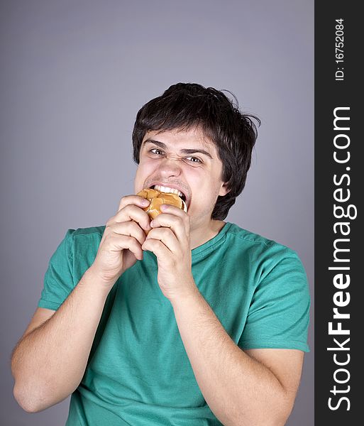 Cute Boy Eating Hamburger.