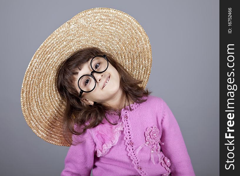 Funny girl in cap and glasses.