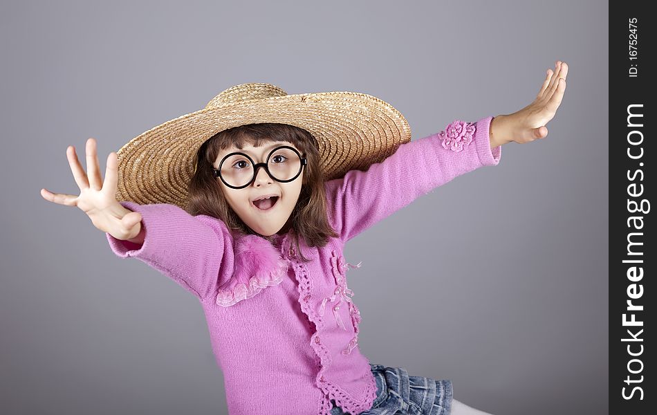 Funny Girl In Cap And Glasses.