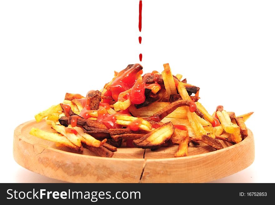 French fries drizzled with ketchup