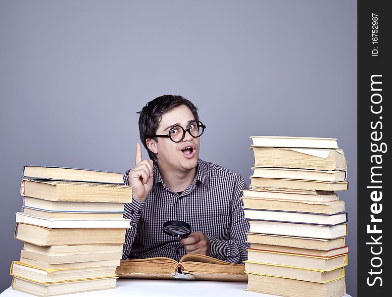 The young student with the books isolated.