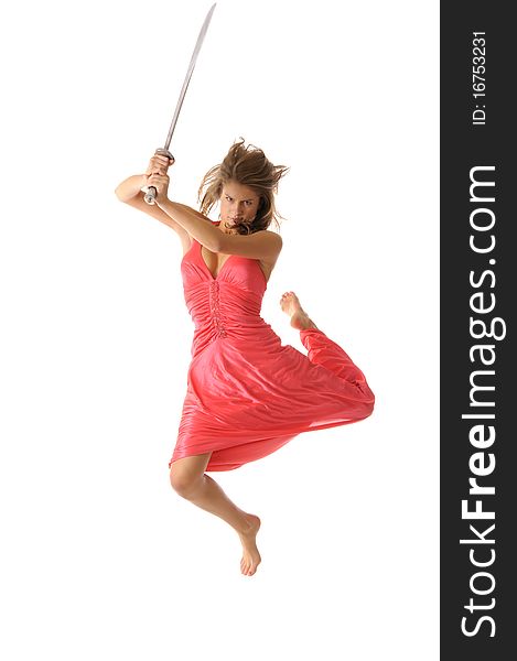 Young woman in jump with sword isolated on the white