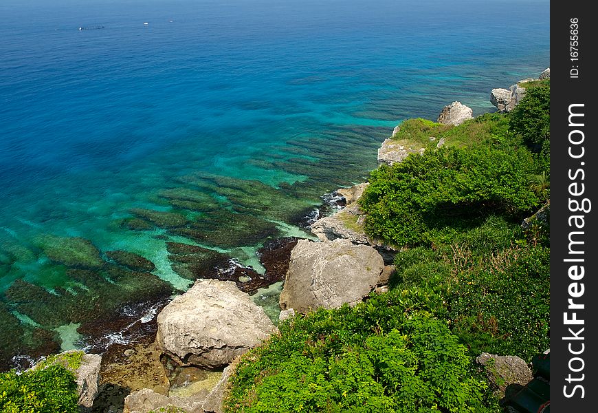 Green coral reef and blue sea in Taiwan, what a beautiful island. Green coral reef and blue sea in Taiwan, what a beautiful island