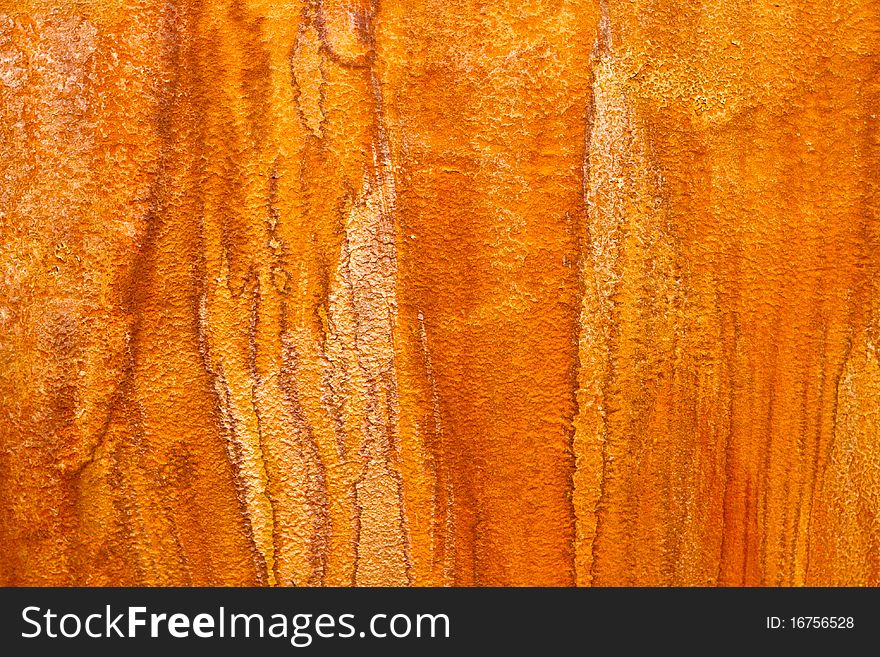 Rusty metal texture, orange background