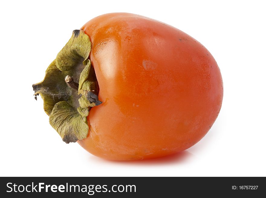 Ripe persimmon isolated over white background (macro shot)