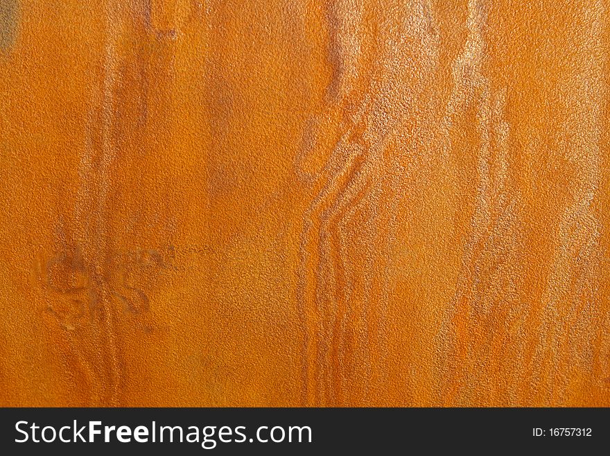 Rusty metal texture, orange background