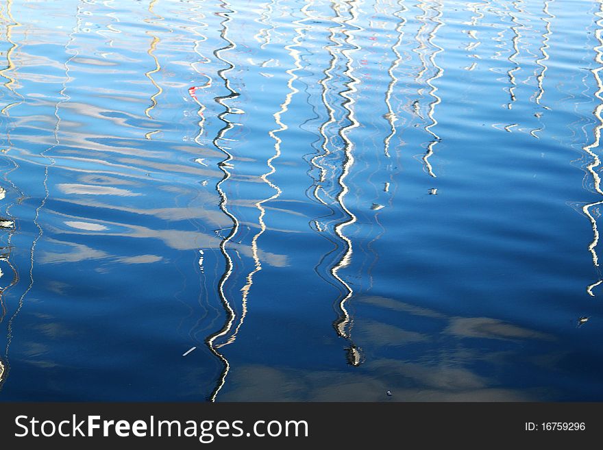 Reflection of boats in the sea water. Reflection of boats in the sea water
