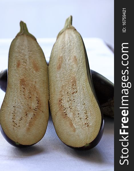 Eggplant show details background white plate. Eggplant show details background white plate