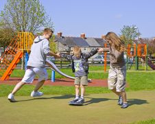 A Young Family Play Together Royalty Free Stock Photography A Young Family Play Together Royalty Free Stock Photography