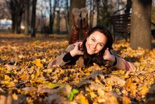 Beautiful Young Woman Lying In Autumn Leaves Royalty Free Stock Images Beautiful Young Woman Lying In Autumn Leaves Royalty Free Stock Images